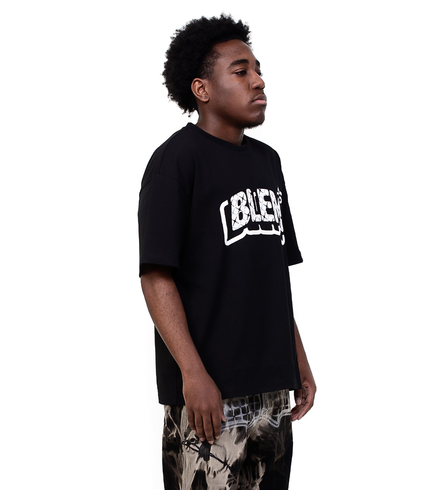 Side view of model wearing classic black blem shirt